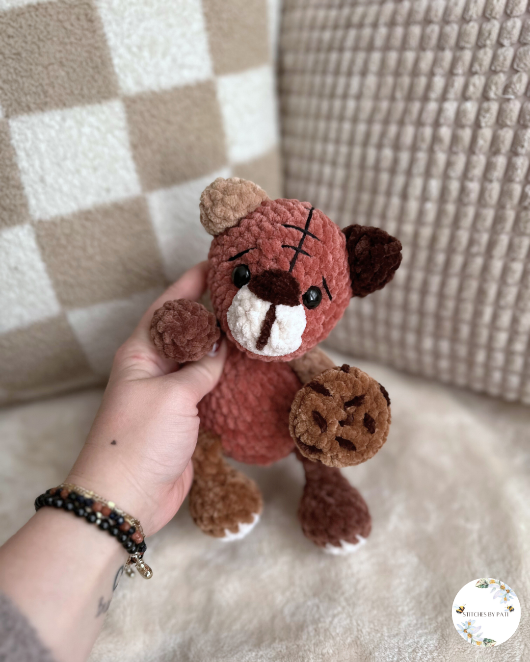 A Patchling Bear Holding a Cookie - Theo the Teddy Bear - Crochet Plushie